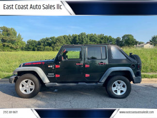Used 2012 Jeep Wrangler Unlimited Sport image 1