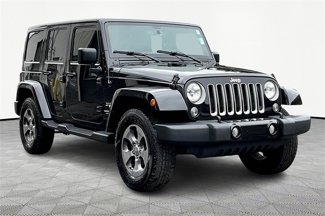 Used 2016 Jeep Wrangler Unlimited Sahara image 1