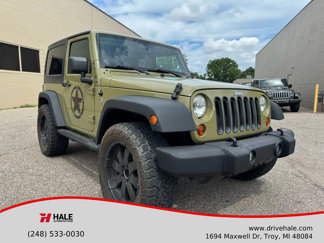 Used 2013 Jeep Wrangler Sport image 1