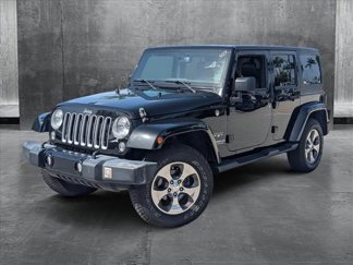 Used 2016 Jeep Wrangler Unlimited Sahara w/ Dual Top Group image 1