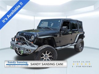 Used 2012 Jeep Wrangler Unlimited Sport image 1