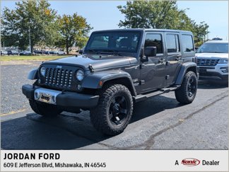 Used 2014 Jeep Wrangler Unlimited Sahara w/ Dual Top Group image 1