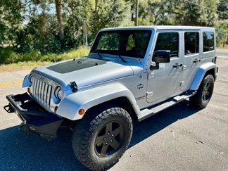 Used 2012 Jeep Wrangler Unlimited Sahara image 1