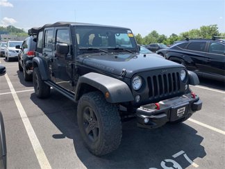 Used 2016 Jeep Wrangler Unlimited Sport image 1