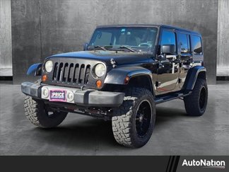 Used 2012 Jeep Wrangler Unlimited Sahara w/ Connectivity Group image 1