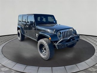 Used 2015 Jeep Wrangler Unlimited Sport image 1