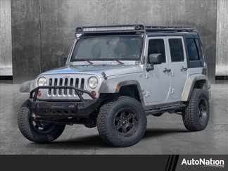 Used 2011 Jeep Wrangler Unlimited Sport image 1