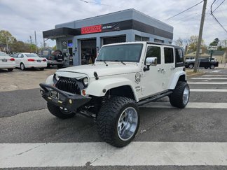 Used 2010 Jeep Wrangler Unlimited Sport image 1