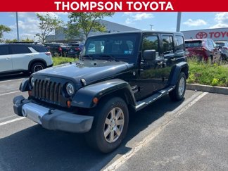 Used 2013 Jeep Wrangler Unlimited Sahara w/ Connectivity Group image 1