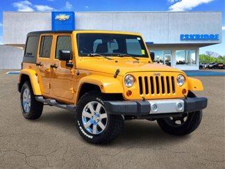 Used 2012 Jeep Wrangler Unlimited Sahara w/ Max Tow Pkg image 1