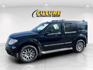 Used 2012 Nissan Pathfinder LE image 1