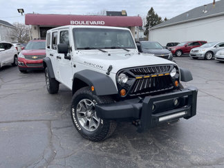 Used 2013 Jeep Wrangler Unlimited Rubicon w/ Dual Top Group image 1