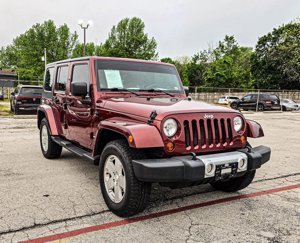 Used 2010 Jeep Wrangler Unlimited Sahara w/ Dual Top Group image 1