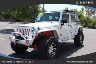 Used 2012 Jeep Wrangler Unlimited Rubicon w/ Connectivity Group image 1