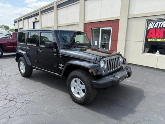 Used 2014 Jeep Wrangler Unlimited Sport image 1