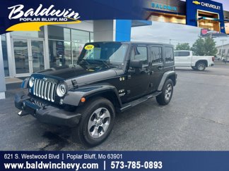 Used 2016 Jeep Wrangler Unlimited Sahara image 1