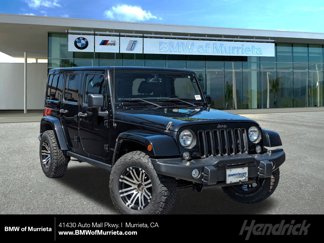 Used 2016 Jeep Wrangler Unlimited Sahara image 1