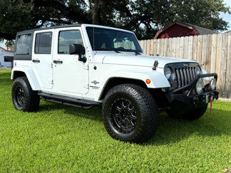 Used 2014 Jeep Wrangler Unlimited Sport image 1