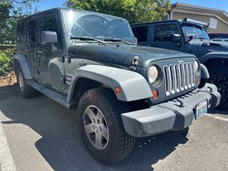 Used 2011 Jeep Wrangler Unlimited Sport image 1