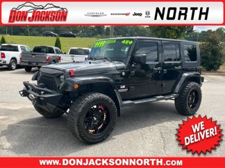 Used 2010 Jeep Wrangler Unlimited Sahara w/ Dual Top Group image 1