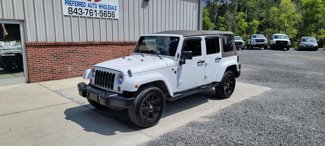 Used 2013 Jeep Wrangler Unlimited Sahara image 1