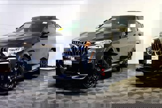 Used 2021 BMW X6 M50i w/ Executive Package image 1