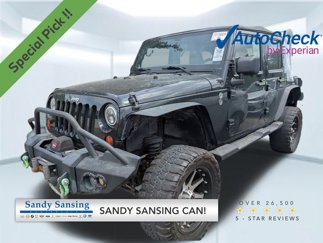 Used 2012 Jeep Wrangler Unlimited Sport image 1