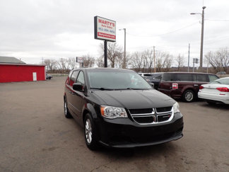 Used 2013 Dodge Grand Caravan SXT w/ Rear Park Assist Pkg image 1