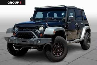 Used 2012 Jeep Wrangler Unlimited Sport image 1