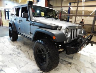 Used 2015 Jeep Wrangler Unlimited Rubicon w/ Dual Top Group image 1