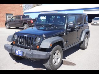 Used 2012 Jeep Wrangler Unlimited Rubicon w/ Dual Top Group image 1