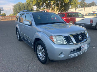 Used 2011 Nissan Pathfinder LE w/ Navigation Pkg image 1