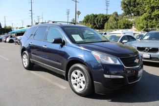 Used 2015 Chevrolet Traverse LS w/ LPO, 'HIT The Road' Package image 1