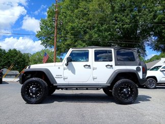 Used 2013 Jeep Wrangler Unlimited Sport image 1