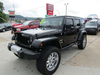 Used 2015 Jeep Wrangler Unlimited Sahara image 1