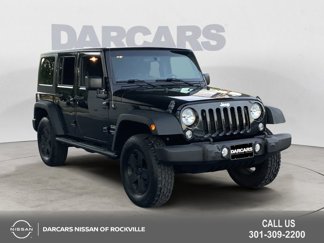 Used 2017 Jeep Wrangler Unlimited Sport w/ Mopar Black Appearance Group image 1