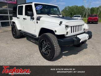 Used 2013 Jeep Wrangler Unlimited Sahara w/ Dual Top Group image 1