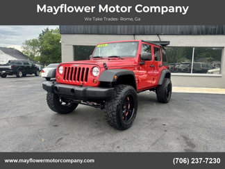 Used 2012 Jeep Wrangler Unlimited Sport image 1