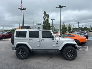 Used 2012 Jeep Wrangler Unlimited Sahara image 1
