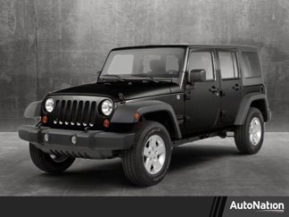 Used 2011 Jeep Wrangler Unlimited Sport image 1