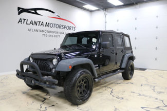 Used 2014 Jeep Wrangler Unlimited Sport image 1