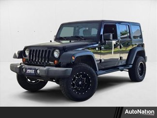 Used 2013 Jeep Wrangler Unlimited Sport image 1