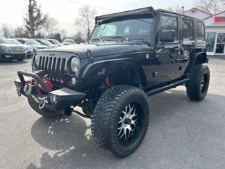 Used 2017 Jeep Wrangler Unlimited Sport image 1