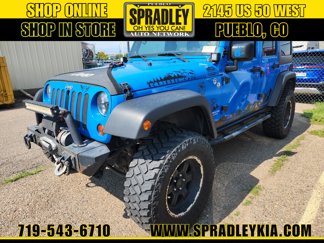 Used 2012 Jeep Wrangler Unlimited Rubicon w/ Dual Top Group image 1