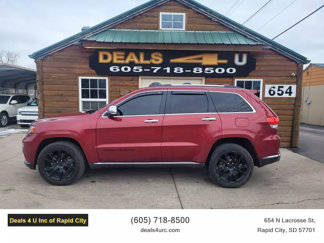 Used 2014 Jeep Grand Cherokee Summit image 1