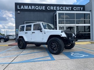 Used 2014 Jeep Wrangler Unlimited Sahara image 1