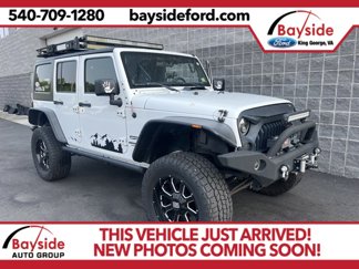Used 2014 Jeep Wrangler Unlimited Sport image 1