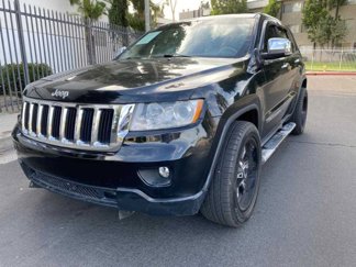 Used 2013 Jeep Grand Cherokee Overland w/ Advance Technology Group image 1