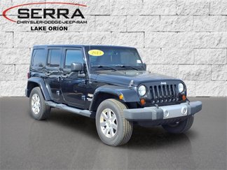 Used 2013 Jeep Wrangler Unlimited Sahara w/ Dual Top Group image 1