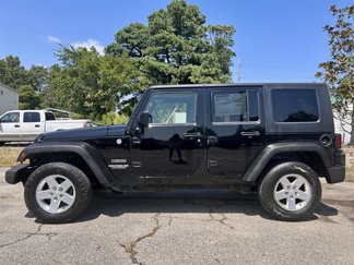 Used 2010 Jeep Wrangler Unlimited Sport image 1